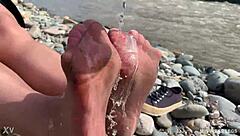 Goddess flaunts filthy nylon feet in torn pantyhose by river