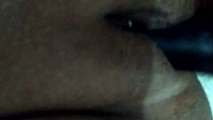 Wife playfully uses dildo at home, amateurs having fun! 😏