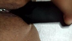 Wife playfully uses dildo at home, amateurs having fun! 😏