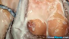 classy hottie gets drenched in messy bukkake action