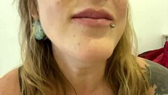 This curvy mature milf with tattoos indulges in gummy bear vore fetish. She swallows them with dirty talk.