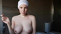 Cute Brunette Babe Smokes While Showing Off Petite Big Tits