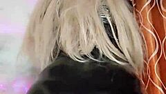 latex transsexual indulges in solo play, exploring desires through intense self-pleasure.