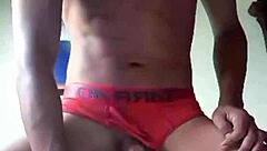 Latina in red teases black amateur with her curves