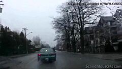 a redhead teen relaxes in the car outdoors