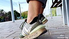 Tan nylon soles tease on bench