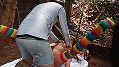 A latina friend uses a sex toy on her pussy outdoors in public.