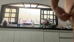 Bold exhibitionist flashes panties while washing dishes at father-in-law's house