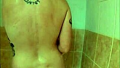 Intense squirting housewife with pierced nipples goes wild in amateur shower close-up action
