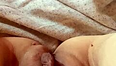 Milf opens her pussy wide.