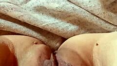 Milf opens her pussy wide.