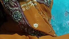 Watch her masturbate under the ghunghat, teasing her pussy.