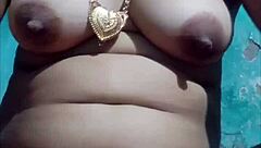 Watch her masturbate under the ghunghat, teasing her pussy.