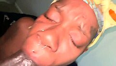 She wraps her lips around that big black cock in POV.