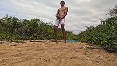 African handjob leads to cumshot on the beach