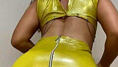 a curly-haired brunette dancing funk in a mini skirt provokes a young guy