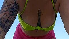 African exhibitionist flashes on the beach