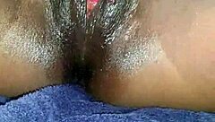 Black ebony woman masturbates in close up