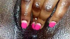 Black ebony woman masturbates in close up