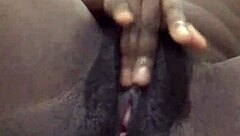 The muscular ebony whore with small tits got wet in homemade solo, masturbating her pussy to orgasm before assfucking.