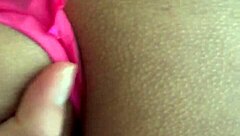 she wears pink lingerie while he penetrates her deeply