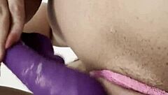 beautiful latina relaxes with self-massage on rainy afternoon