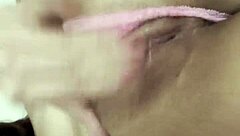 beautiful latina relaxes with self-massage on rainy afternoon