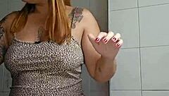 She wears tight shorts stuffed in big pussy for exhibitionist flash