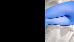 admiring sexy pantyhose paired with blue high heels