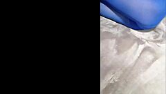 admiring sexy pantyhose paired with blue high heels