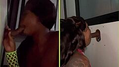 She sucks strangers' big black cocks through the gloryhole, spitting and getting facials