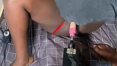 the smooth black operator uses his homemade sex machine on a wet trimmed pussy