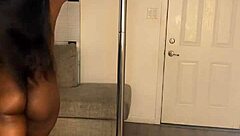Ebony Divine with huge pole shaking fat ass and big tits on a pole