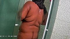 Hidden camera catches brazilian milf neighbor shaving her pussy