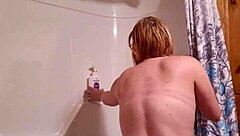 A sneaky video captures me preparing for a relaxing shower in the bathroom.