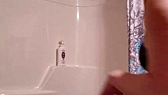 A sneaky video captures me preparing for a relaxing shower in the bathroom.