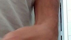 Detailed view of cock stroking leading to cumshot