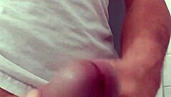 Detailed view of cock stroking leading to cumshot