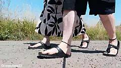 this mature german woman goes barefoot in birkenstocks through the european outdoor nature, enjoying a public fetish vibe.