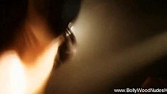 She dances the erotic veil striptease.