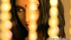 She dances the erotic veil striptease.