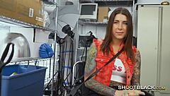 Tattooed slut gags on director's cock before doggystyle