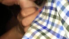 mature blonde interacts with young person in public outdoor setting