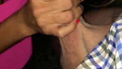 mature blonde interacts with young person in public outdoor setting