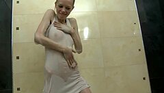 i'm tiny blonde paula z fingering my eager pussy in the bathtub