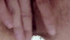 My hairy pussy is dripping with orgasm, she moans softly.