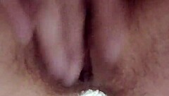 My hairy pussy is dripping with orgasm, she moans softly.