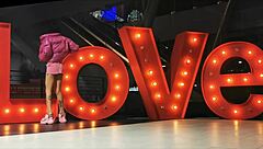 Crossdressing exhibit shows panties under mini skirt