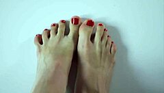 close up of footjob with cum on feet and eating it