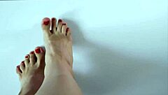 close up of footjob with cum on feet and eating it